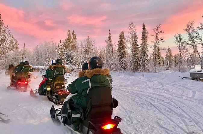 Afternoon Snowmobile Tour - Across frozen lakes near the Torne River