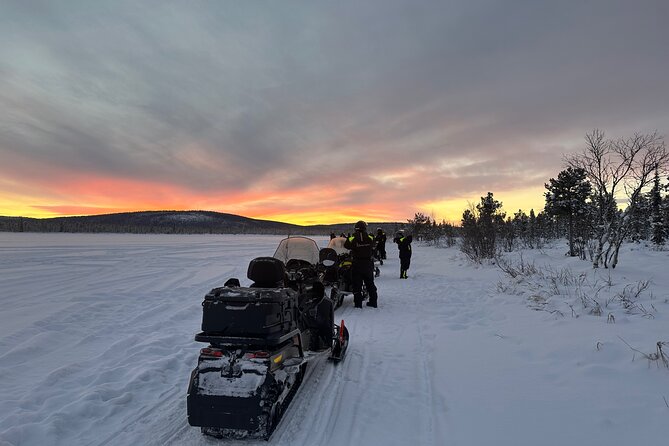 Day tour with snowmobile in Kiruna 10:30 am - The halfway fika with lingonberry juice