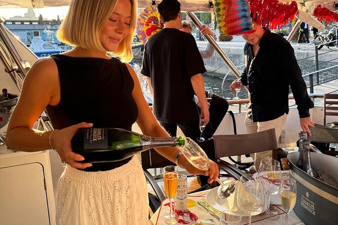 Exclusive Yacht Tour of Stockholm: sunset, dinner, lunch, cruise - Blasieholmen, the Grand Hotel, and Nationalmuseum