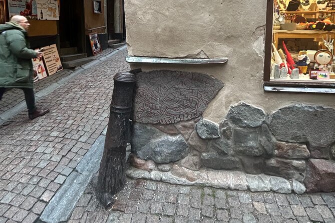 History and Secrets of Gamla Stan Audio GPS Guided Walking Tour - Lars Johan Hierta and the runestone in Gamla Stan
