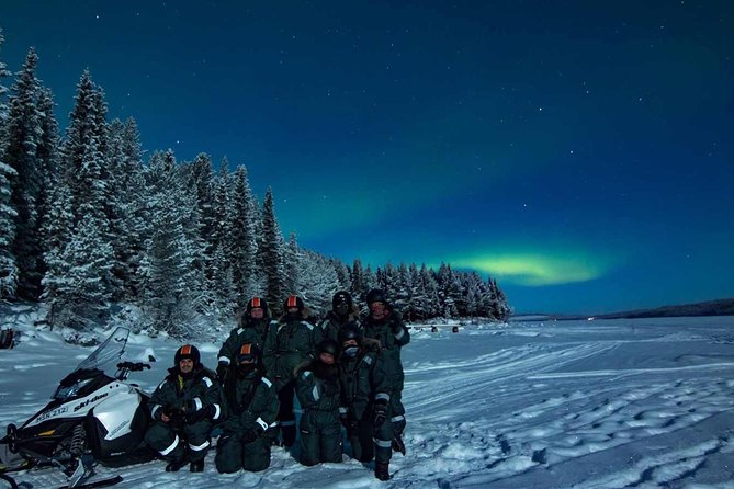 Snowmobile Aurora Expedition with dinner - A forest hut, open fire, and Lapland dinner