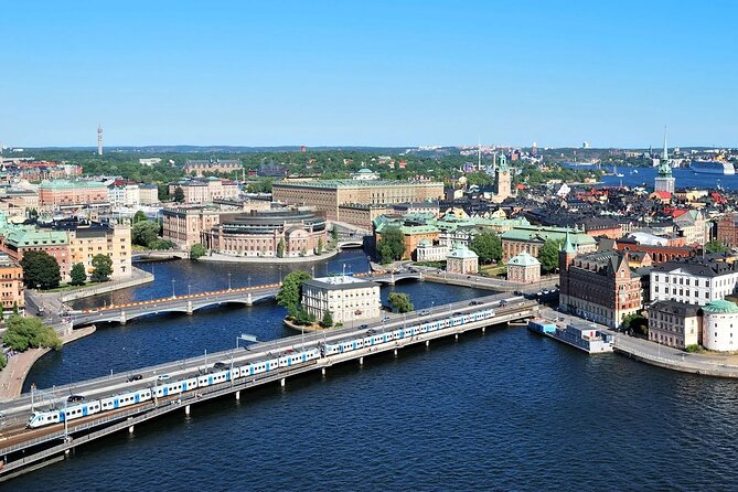 Stockholm's Best Bike Tour! - Stockholm City Hall brings in the water views