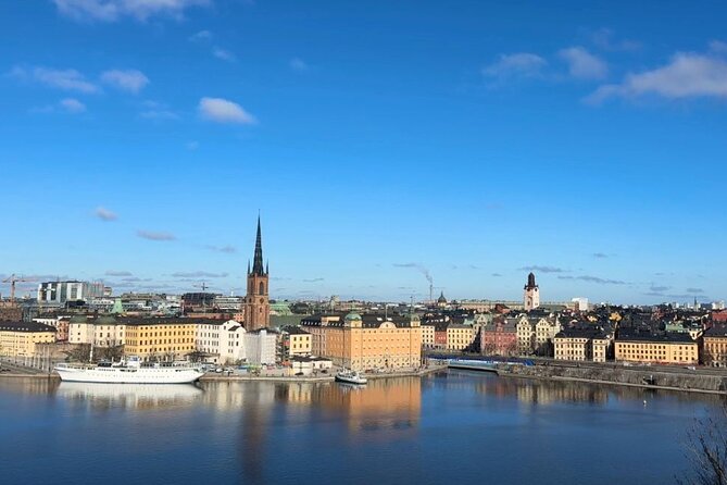 Stockholm Small Group Food Tour with 7 Classic Food Tastings - Walking through Drottninggatan toward Norrmalm