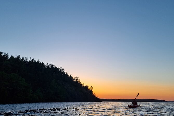 Sunset kayak tour with fika on Stockholms lakeside - Weather is part of the deal