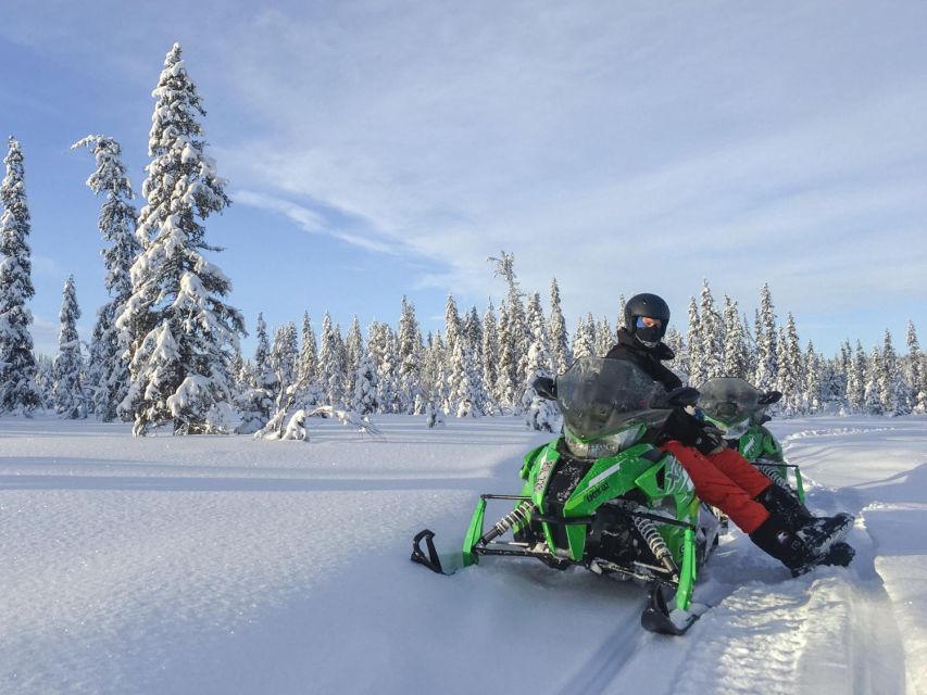 Wilderness Tour with Snowmobile & Ice Fishing - Frozen lakes, forests, and open marshes
